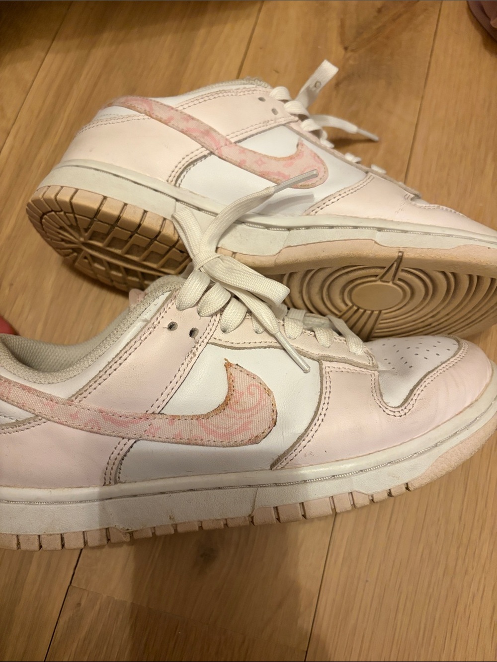Nike Women’s Low-Top Sneakers in Pale Pink and White